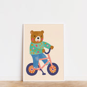 Urso na bicicleta